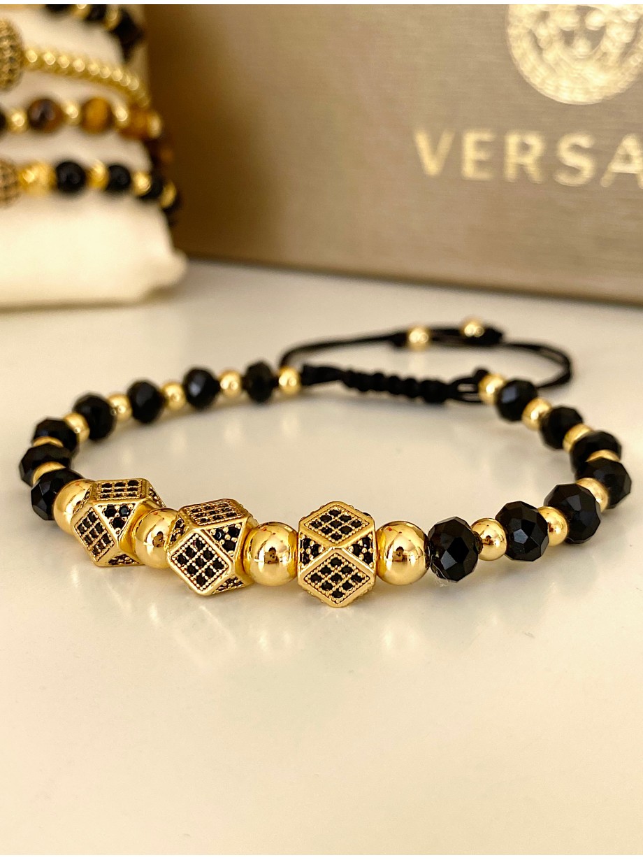 Bratara dama model deosebit cu margele negre si aurii si 3 hexagoane