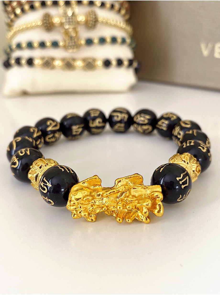 Bratara dama model deosebit cu margele negre si detalii aurii