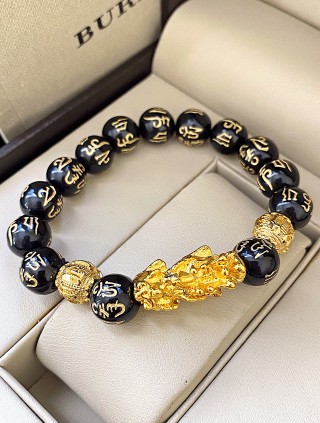 Bratara dama model deosebit cu margele negre si detalii aurii