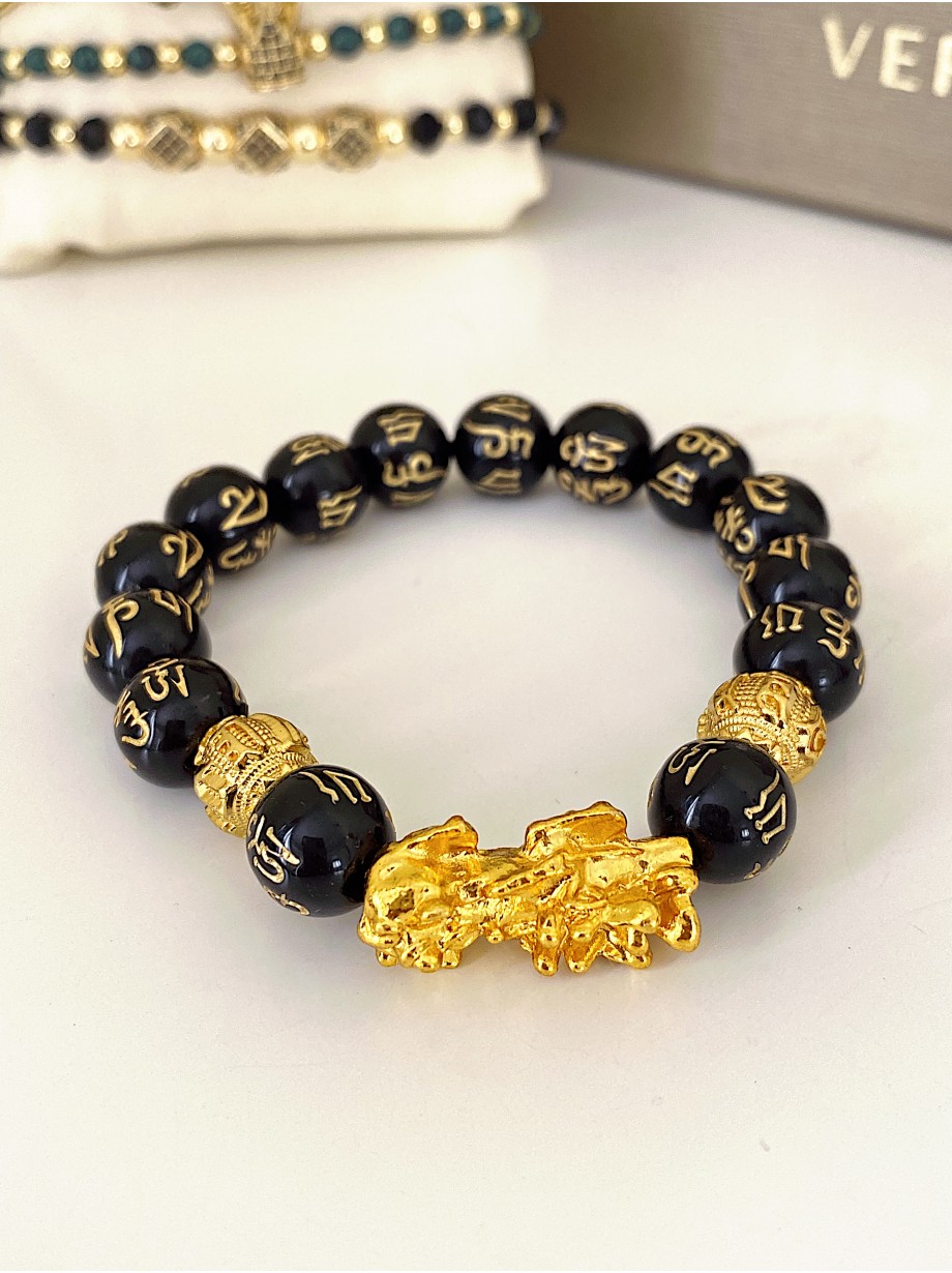 Bratara dama model deosebit cu margele negre si detalii aurii