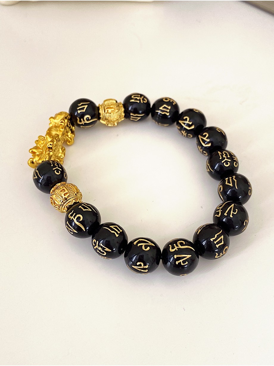 Bratara dama model deosebit cu margele negre si detalii aurii