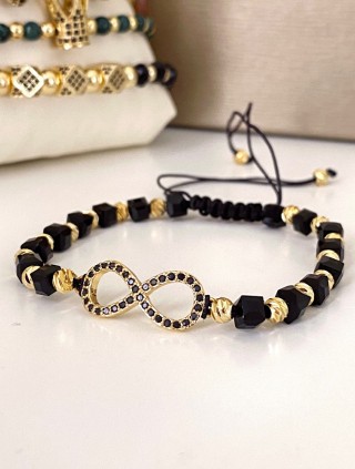 Bratara dama model deosebit cu margele negre cu auriu si infinit cu pietricele stralucitoare