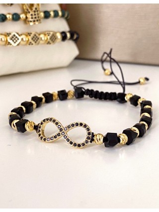 Bratara dama model deosebit cu margele negre cu auriu si infinit cu pietricele stralucitoare