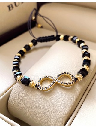 Bratara dama model deosebit cu margele negre cu auriu si infinit cu pietricele stralucitoare
