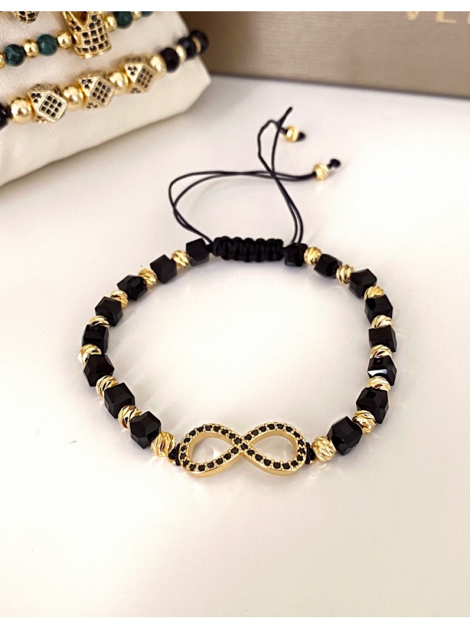 Bratara dama model deosebit cu margele negre cu auriu si infinit cu pietricele stralucitoare