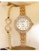 Ceas dama auriu cu bratara metalica si cadran cu pietricele