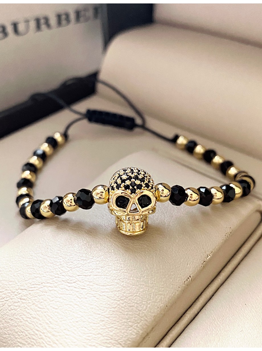 Bratara dama model deosebit cu margele negre si aurii si craniu