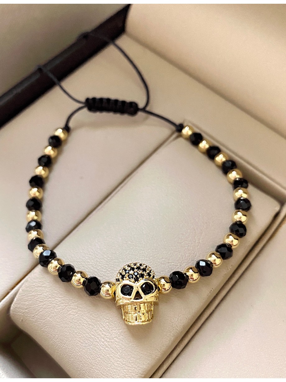 Bratara dama model deosebit cu margele negre si aurii si craniu