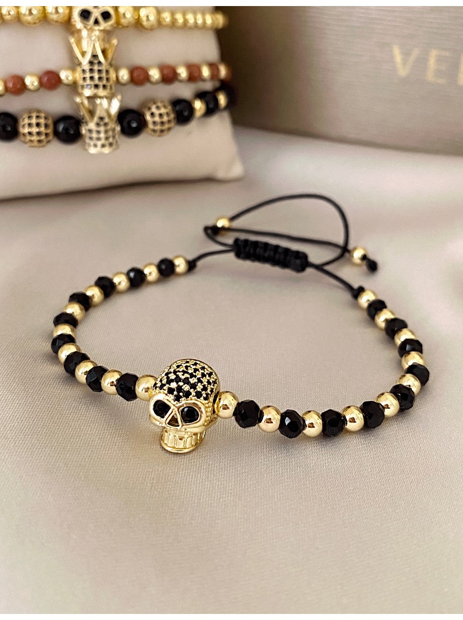 Bratara dama model deosebit cu margele negre si aurii si craniu