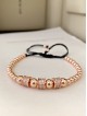 Bratara dama model deosebit cu margele roze si 3 cercuri