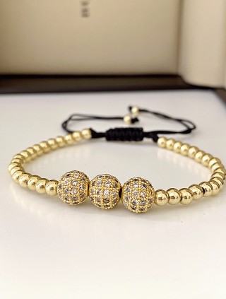 Bratara dama model deosebit cu margele aurii si 3 bilute