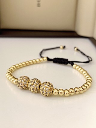 Bratara dama model deosebit cu margele aurii si 3 bilute