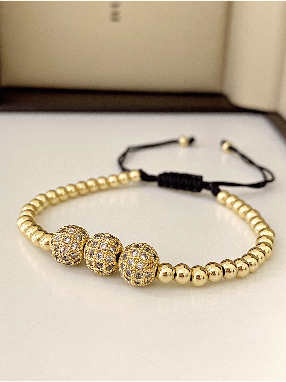 Bratara dama model deosebit cu margele aurii si 3 bilute