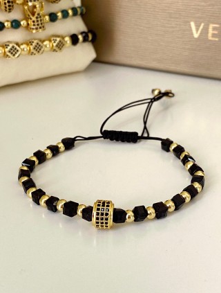 Bratara dama model deosebit cu margele aurii si negre si design cerc