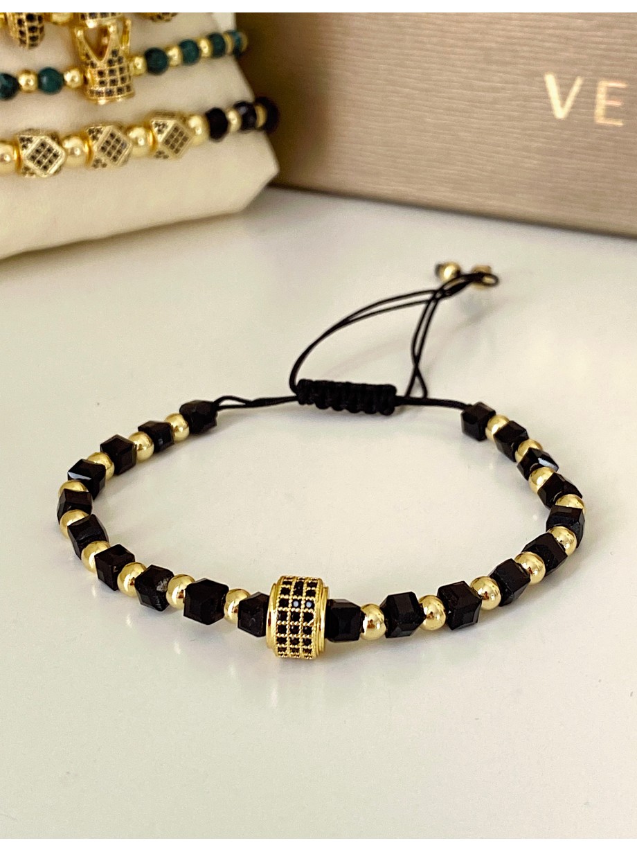 Bratara dama model deosebit cu margele aurii si negre si design cerc