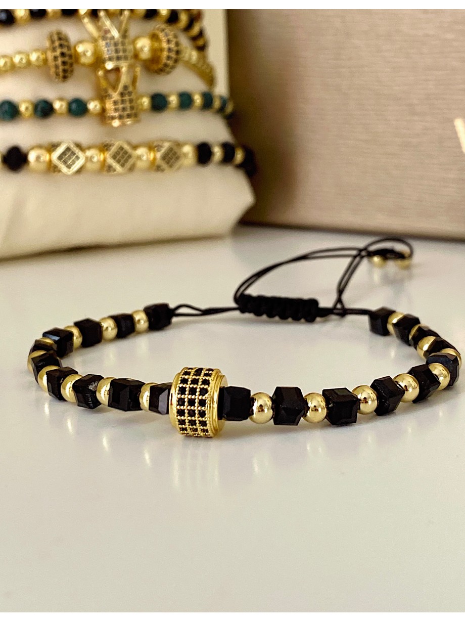 Bratara dama model deosebit cu margele aurii si negre si design cerc