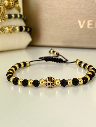 Bratara dama model deosebit cu margele aurii si negre si design biluta