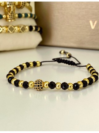 Bratara dama model deosebit cu margele aurii si negre si design biluta