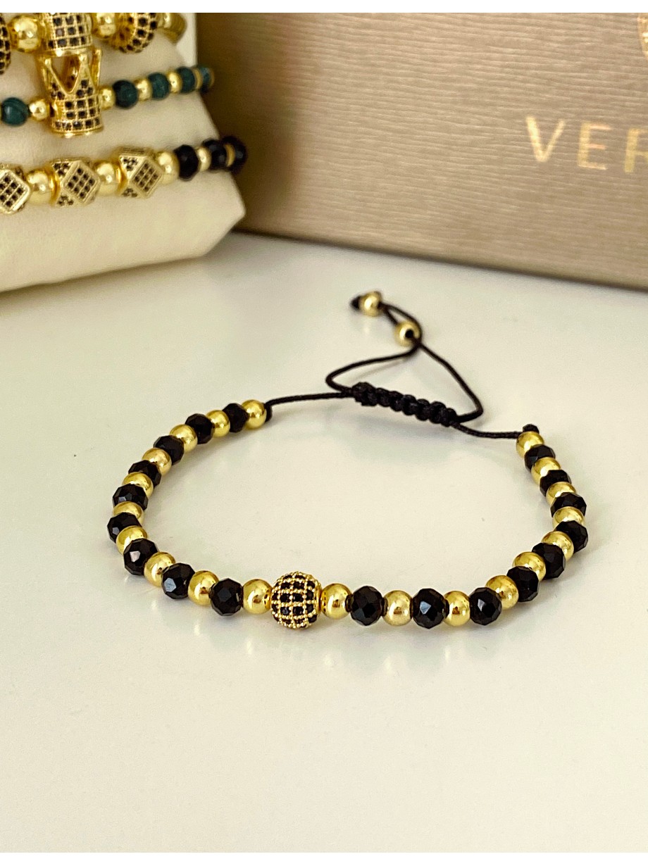 Bratara dama model deosebit cu margele aurii si negre si design biluta