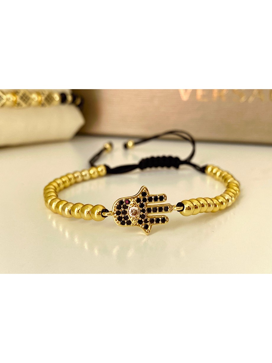 Bratara dama model deosebit cu margele aurii si palma cu pietricele negre