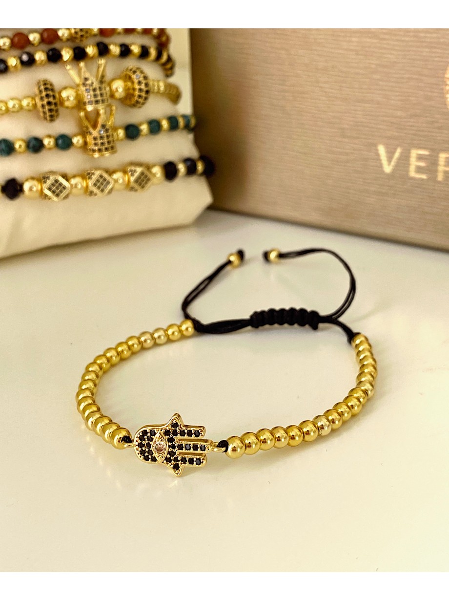 Bratara dama model deosebit cu margele aurii si palma cu pietricele negre