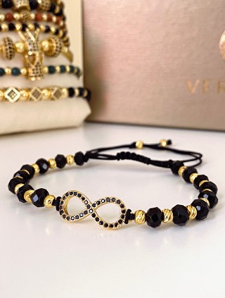 Bratara dama model deosebit cu margele negre cu auriu si infinit cu pietricele stralucitoare