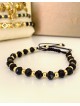Bratara dama model deosebit cu margele negre cu auriu si design simplu