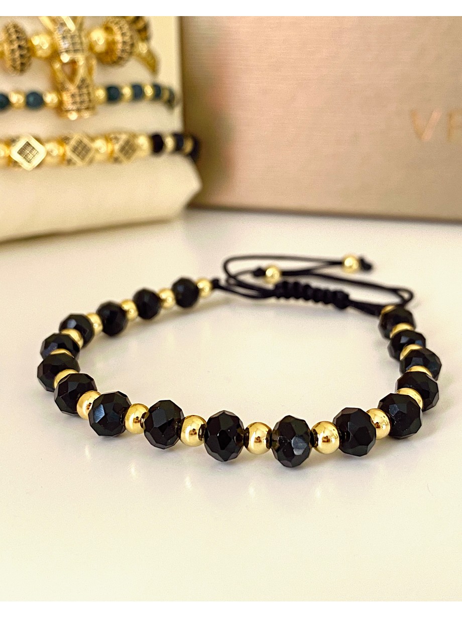 Bratara dama model deosebit cu margele negre cu auriu si design simplu
