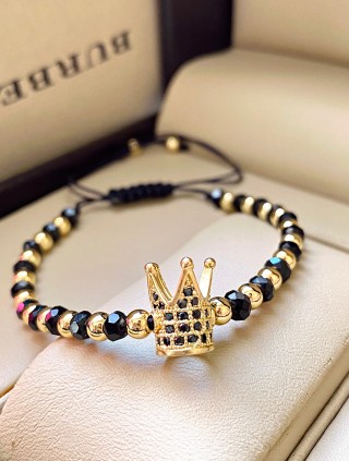 Bratara dama model deosebit cu margele aurii si negre si coroana cu pietricele negre
