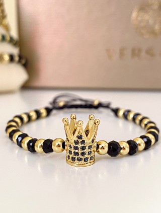 Bratara dama model deosebit cu margele aurii si negre si coroana cu pietricele negre
