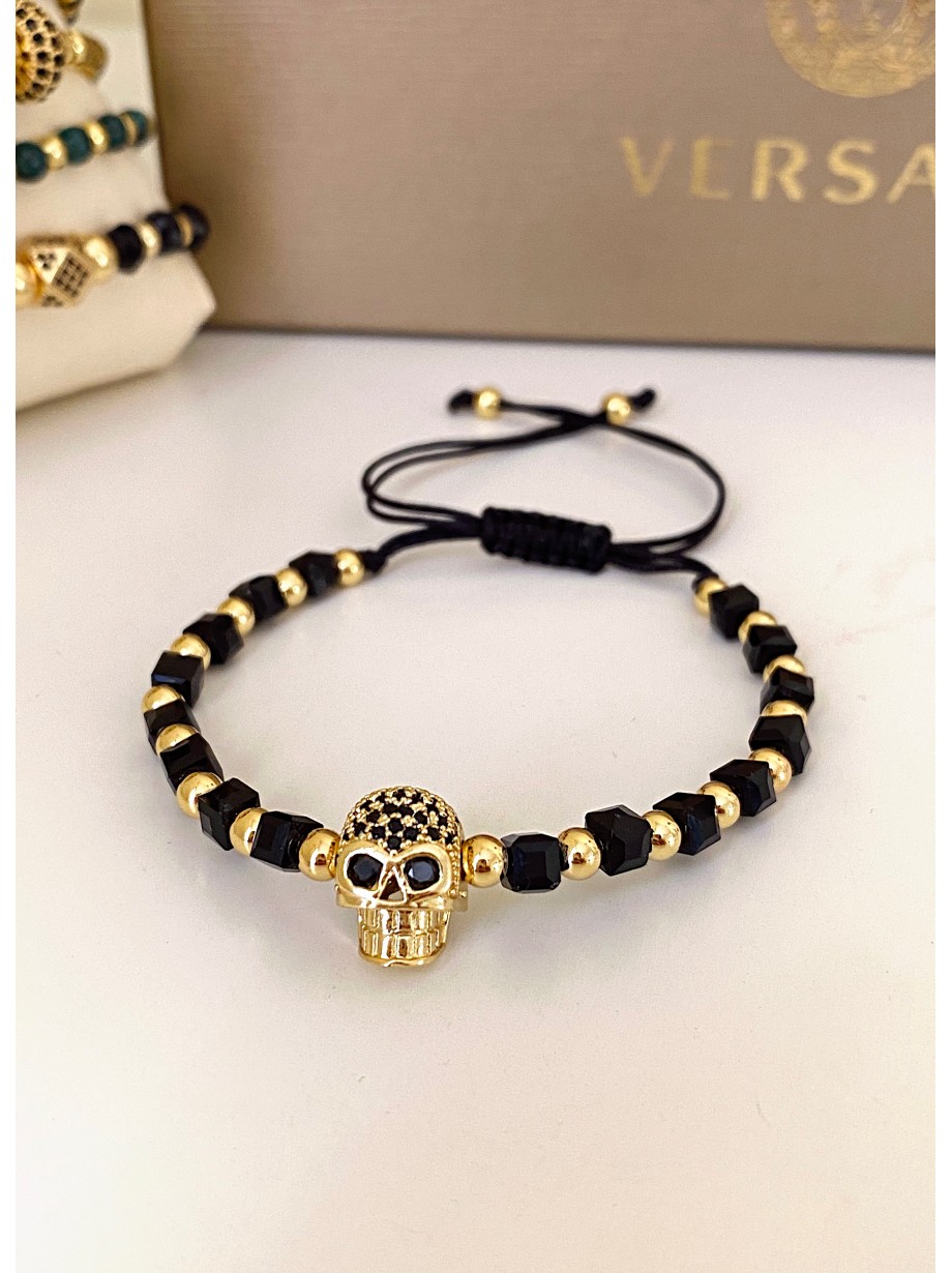 Bratara dama model deosebit cu margele negre si aurii si craniu