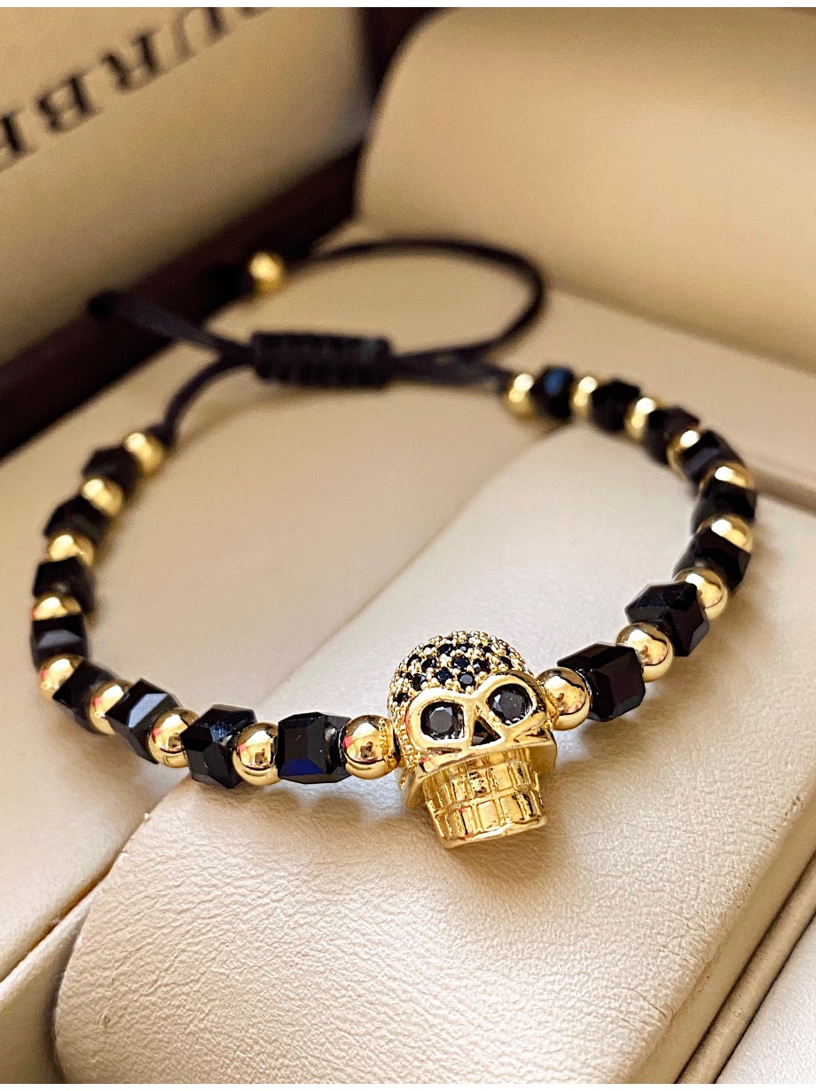 Bratara dama model deosebit cu margele negre si aurii si craniu