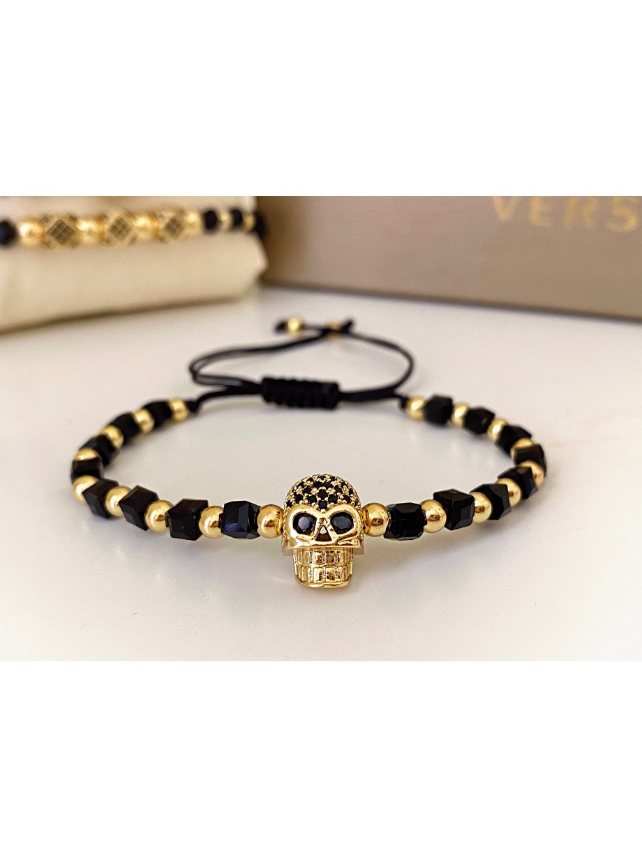Bratara dama model deosebit cu margele negre si aurii si craniu