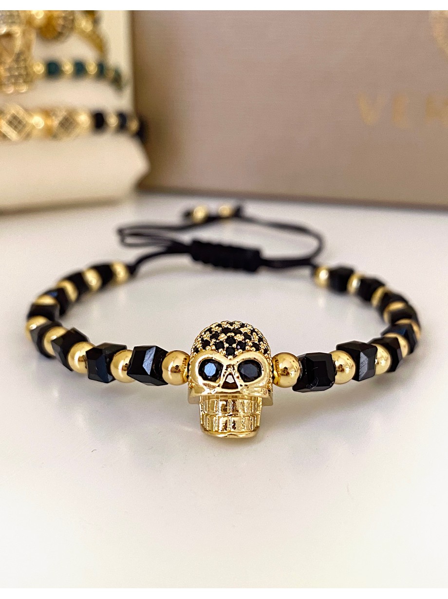 Bratara dama model deosebit cu margele negre si aurii si craniu