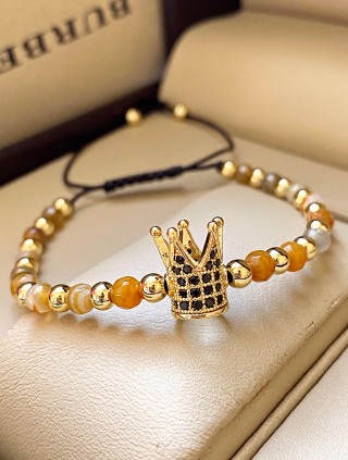 Bratara dama model deosebit cu piatra semipretioasa Ochi de tigru si design special coroana