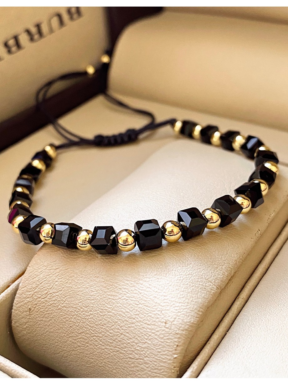 Bratara dama model deosebit cu margele aurii si negre simpla