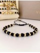 Bratara dama model deosebit cu margele aurii si negre simpla