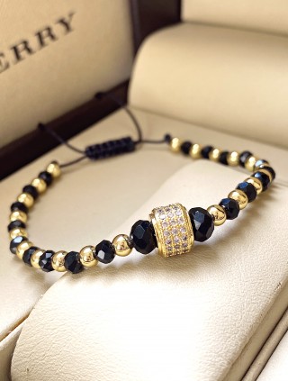 Bratara dama model deosebit cu margele negre si aurii si biluta