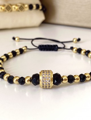 Bratara dama model deosebit cu margele negre si aurii si biluta