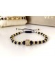 Bratara dama model deosebit cu margele negre si aurii si biluta