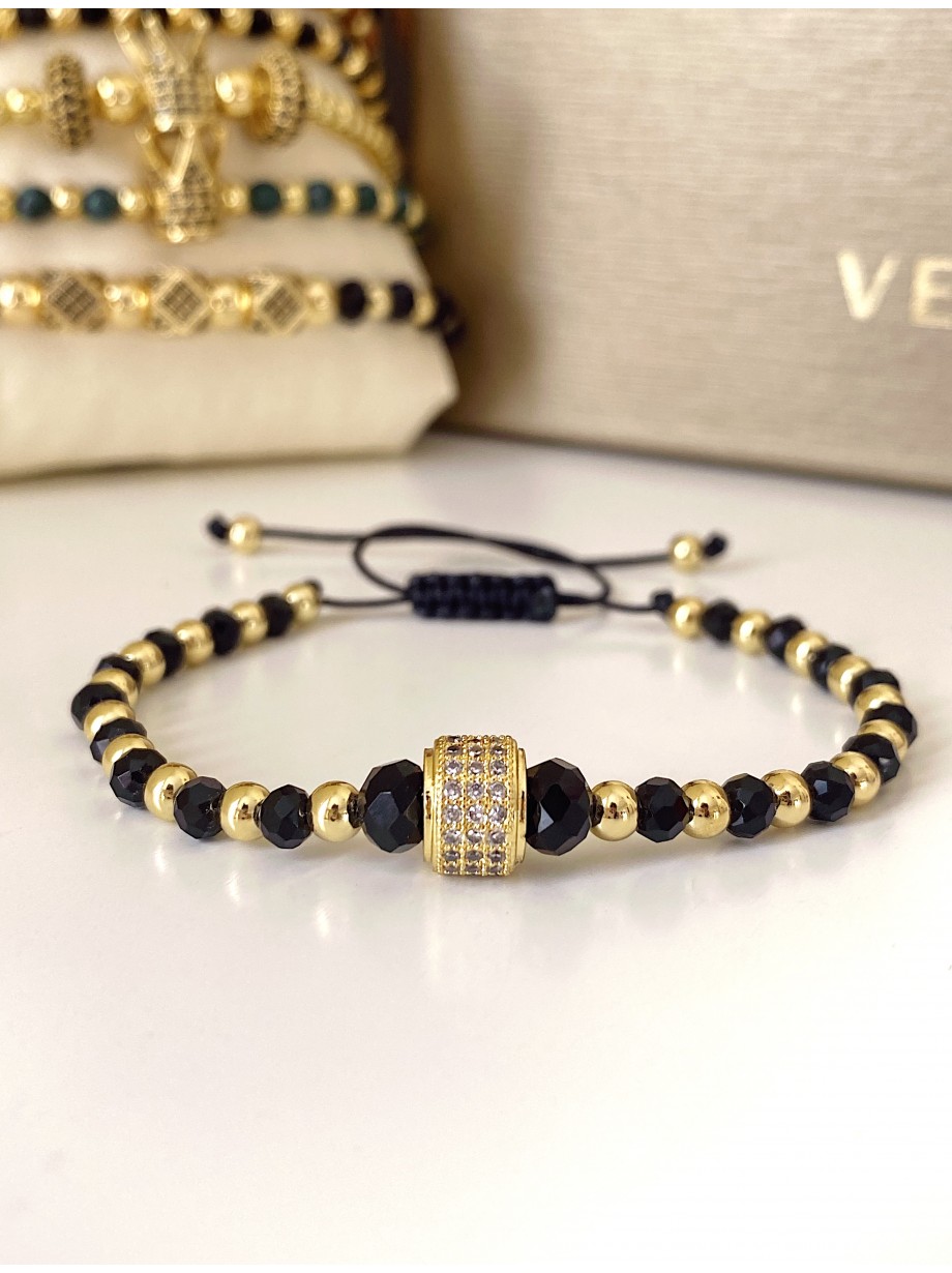 Bratara dama model deosebit cu margele negre si aurii si biluta