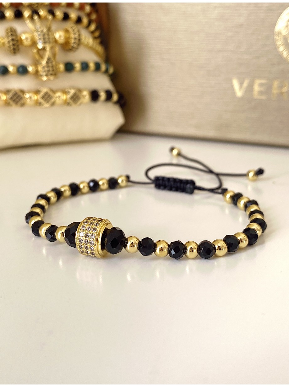 Bratara dama model deosebit cu margele negre si aurii si biluta