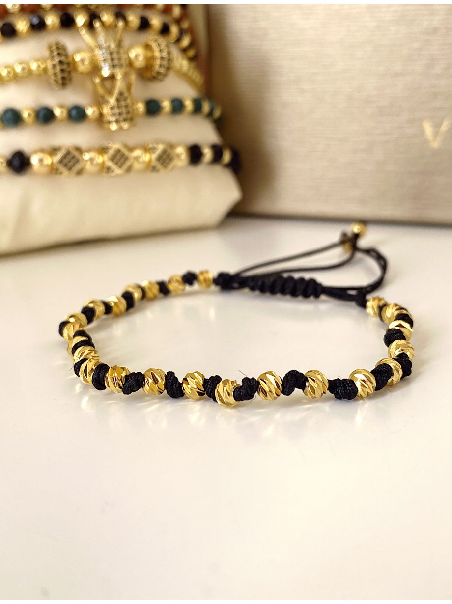 Bratara dama model deosebit cu margele aurii si negre simpla