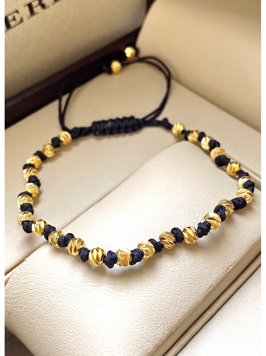 Bratara dama model deosebit cu margele aurii si negre simpla