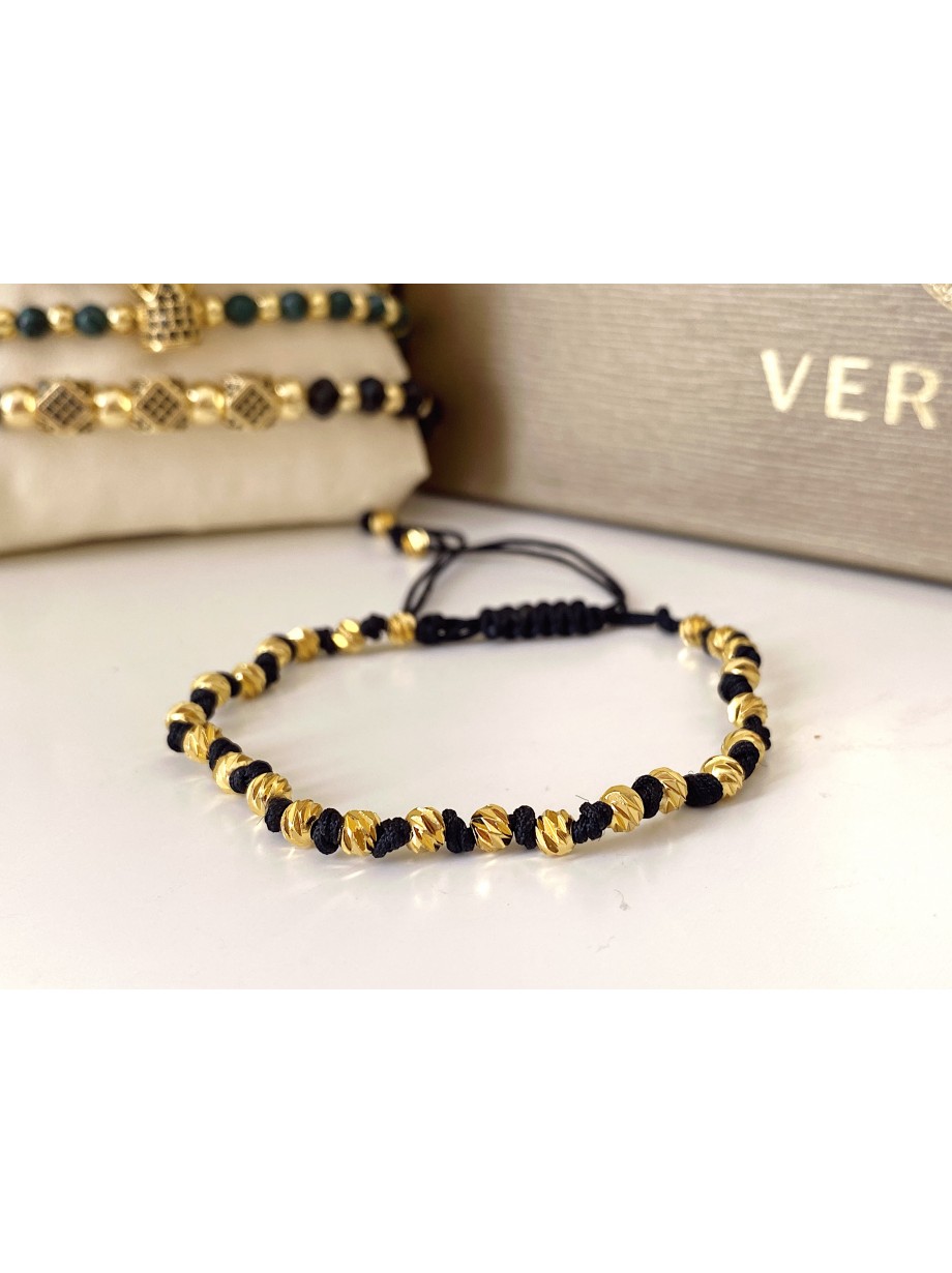 Bratara dama model deosebit cu margele aurii si negre simpla