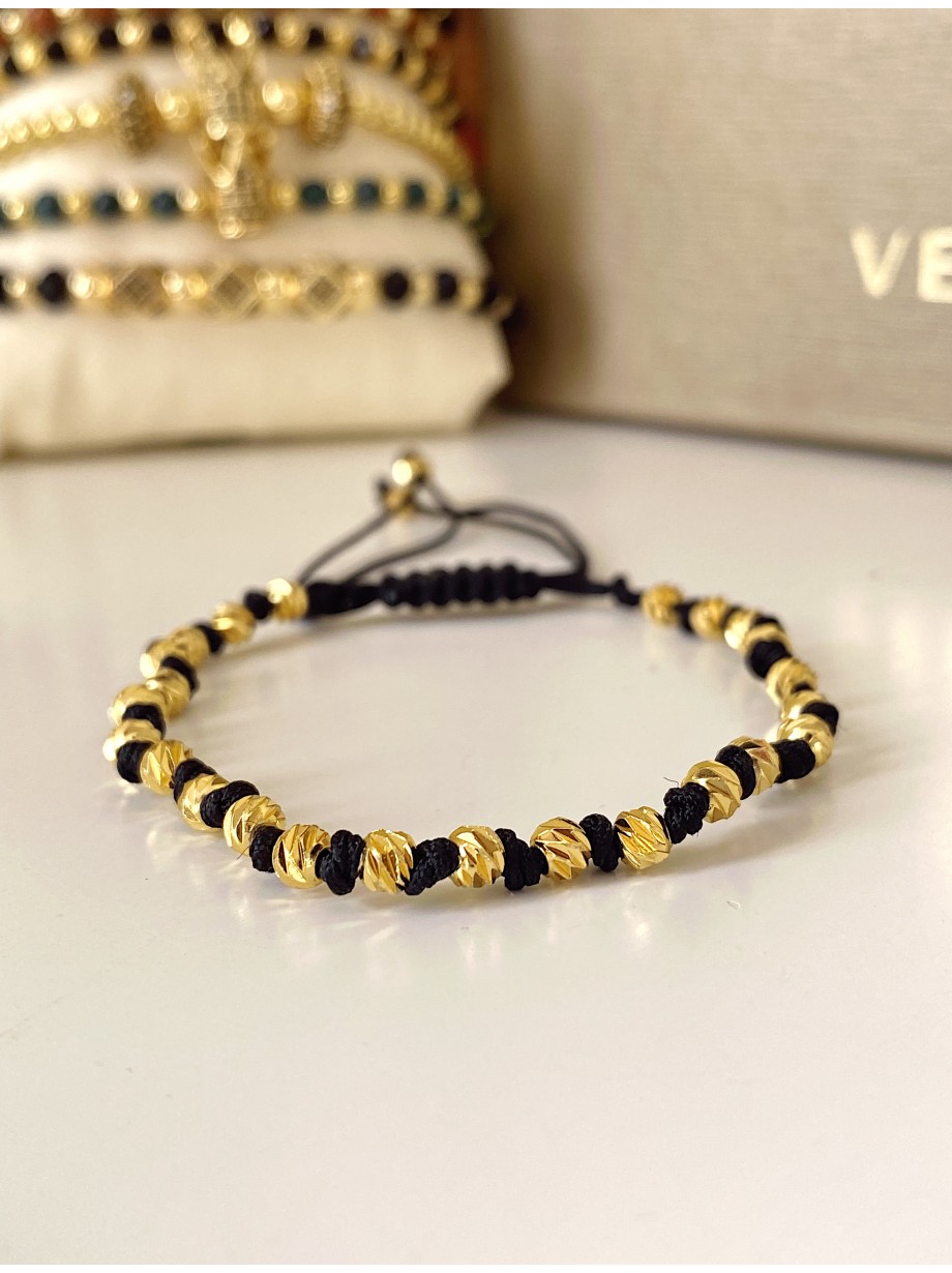 Bratara dama model deosebit cu margele aurii si negre simpla