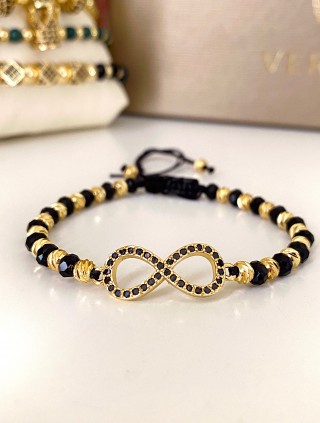 Bratara dama model deosebit cu margele negre cu auriu si infinit cu pietricele stralucitoare