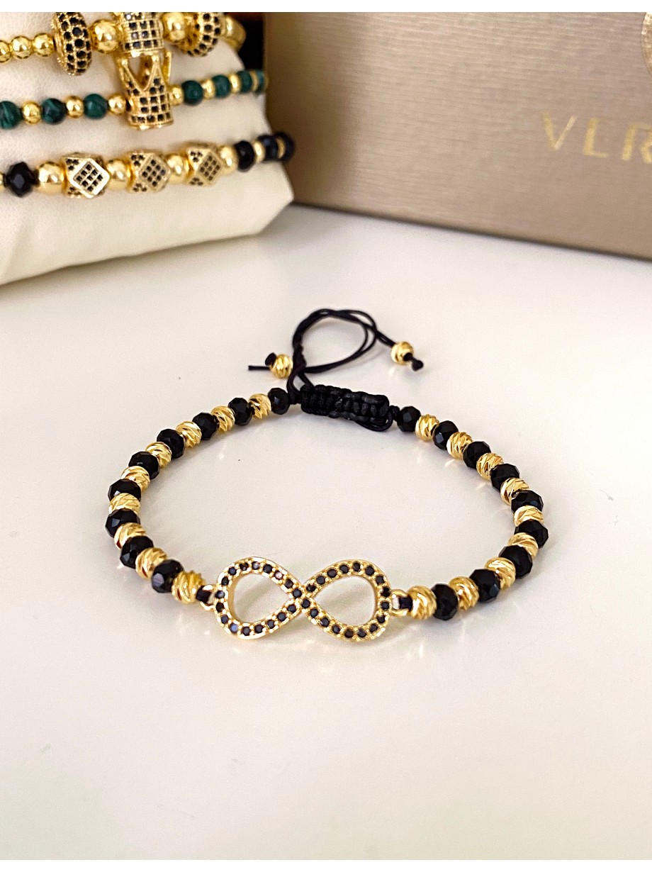 Bratara dama model deosebit cu margele negre cu auriu si infinit cu pietricele stralucitoare