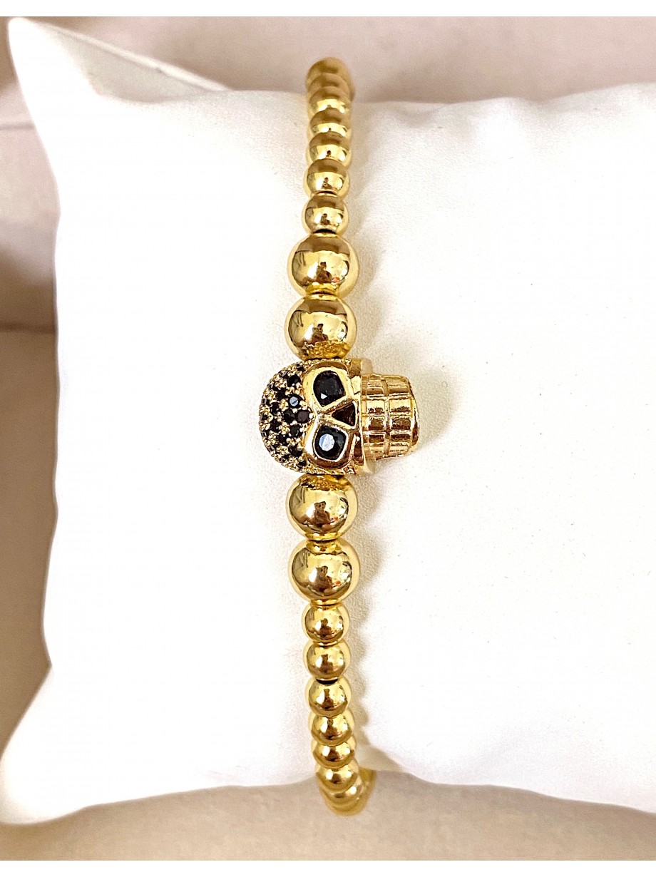 Bratara dama model deosebit cu margele aurii si craniu auriu