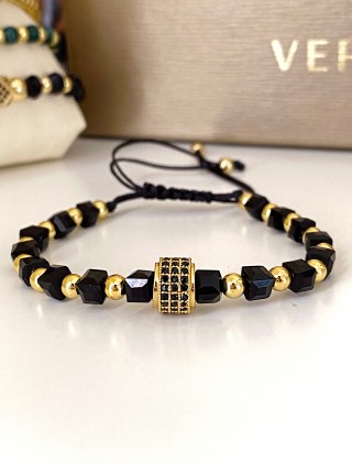 Bratara dama model deosebit cu margele aurii si negre si design cerc